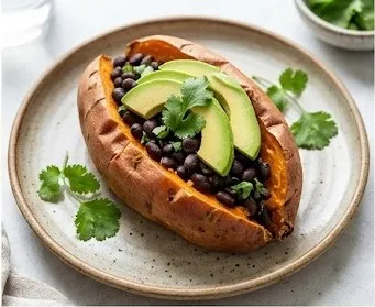 Roasted Sweet Potato Stuffed with Black Beans, Avocado, and Cilantro
